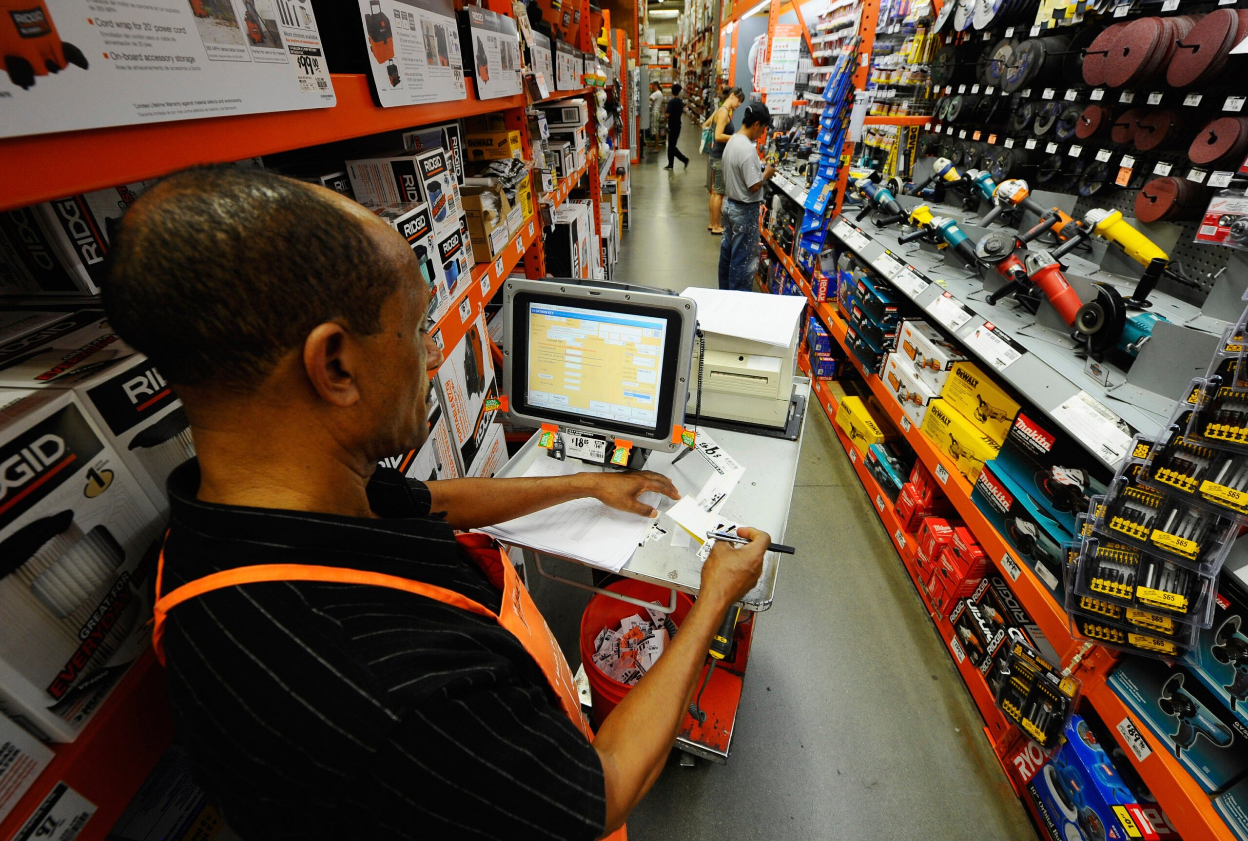 LOS ANGELES - AUGUST 17: Eshetu Tsegahun takes inventory in the hardware tools section of a Home Depot store on August 17, 2010 in Los Angeles, California. Atlanta-based Home Depot Inc.'s fiscal second-quarter profit rose 6.8 percent as they've seen a 1.8 percent increase in sales.  (Photo by Kevork Djansezian/Getty Images)